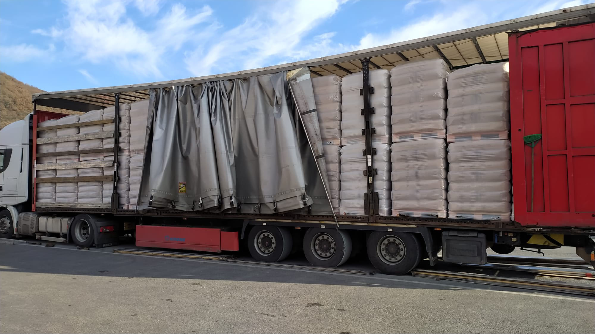 Truck and open trailer