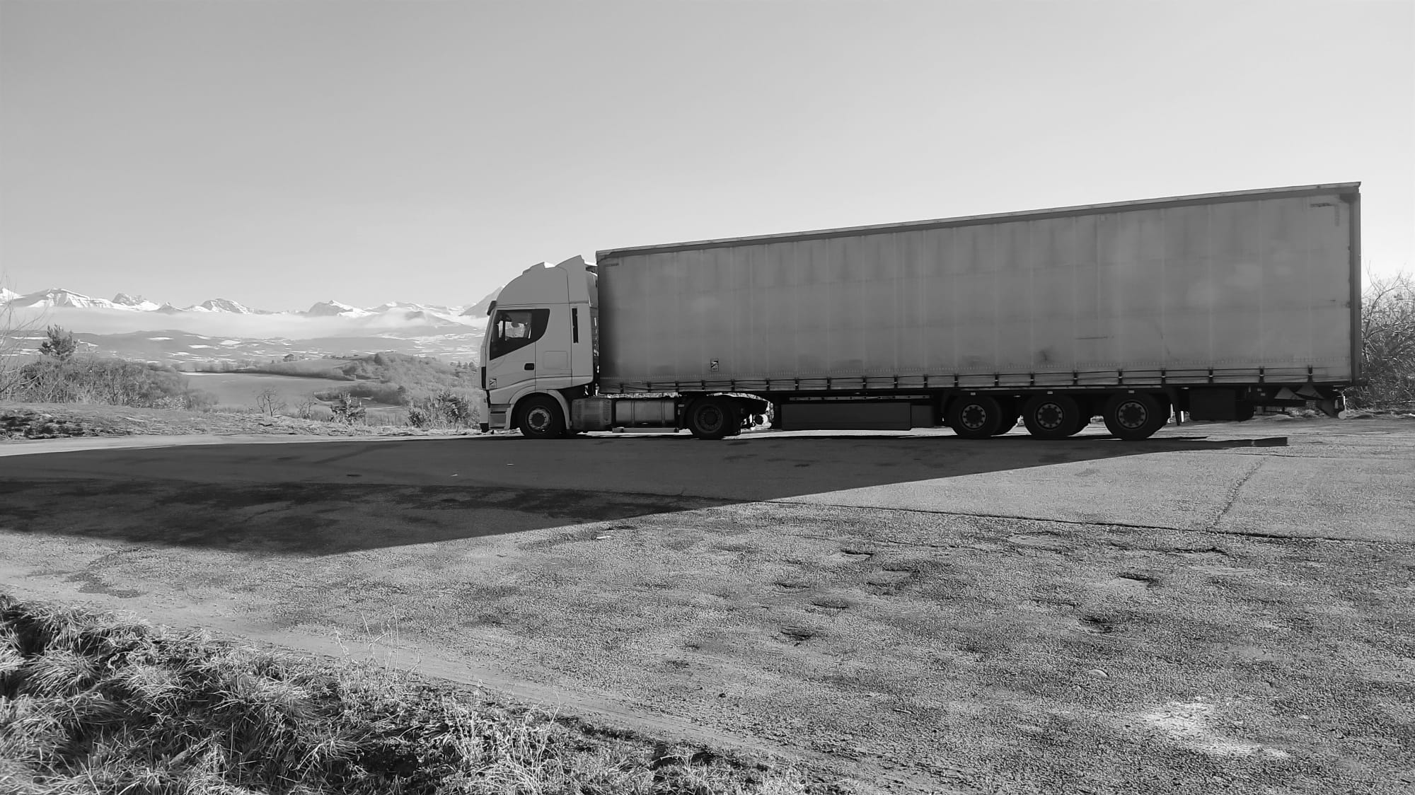 Truck parked with mountain view